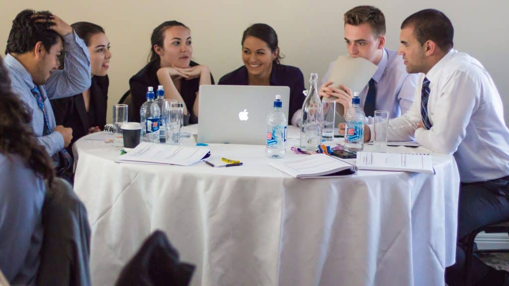 students playing business simulation