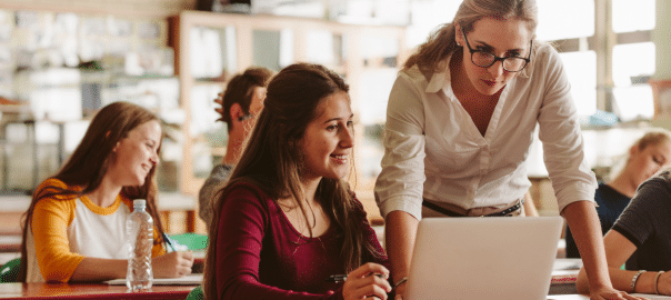 this is an image of an instructor teaching her student business simulations